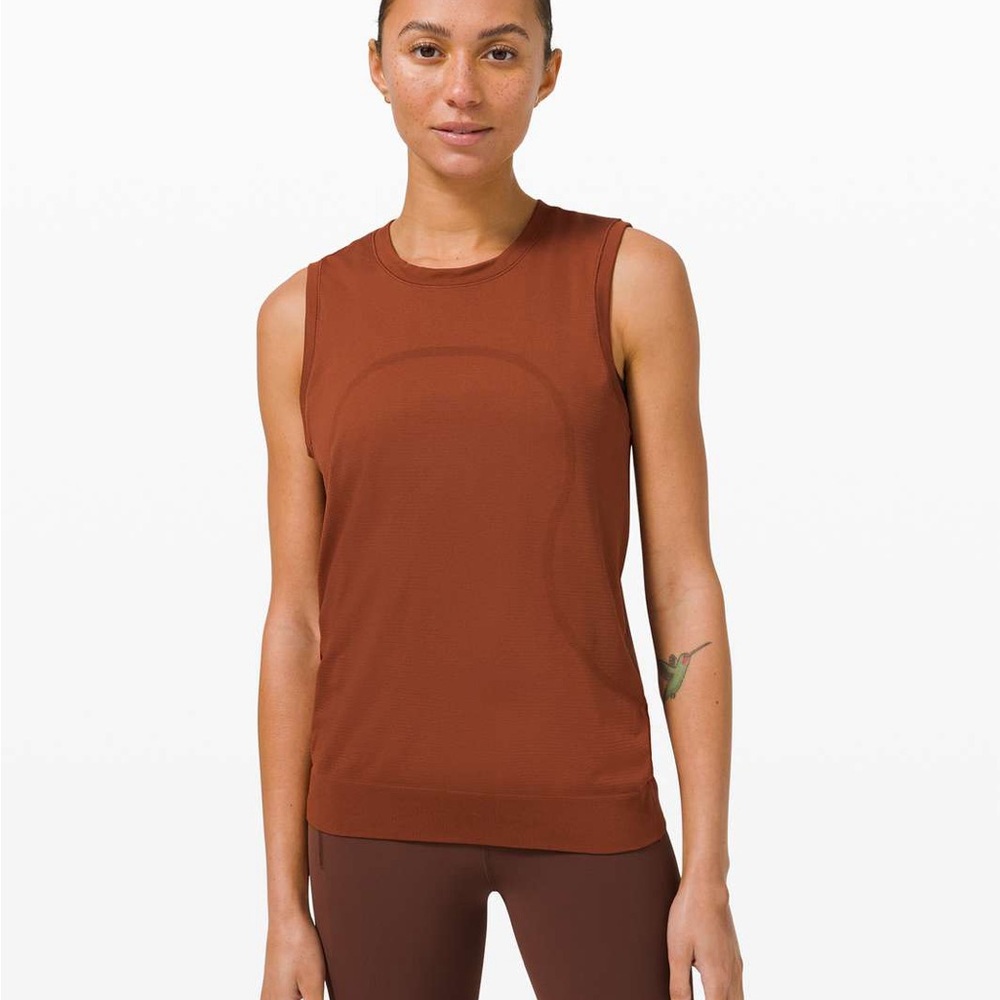 Lululemon Swiftly Breathe Muscle Tank Top
Dark Terracotta - 10